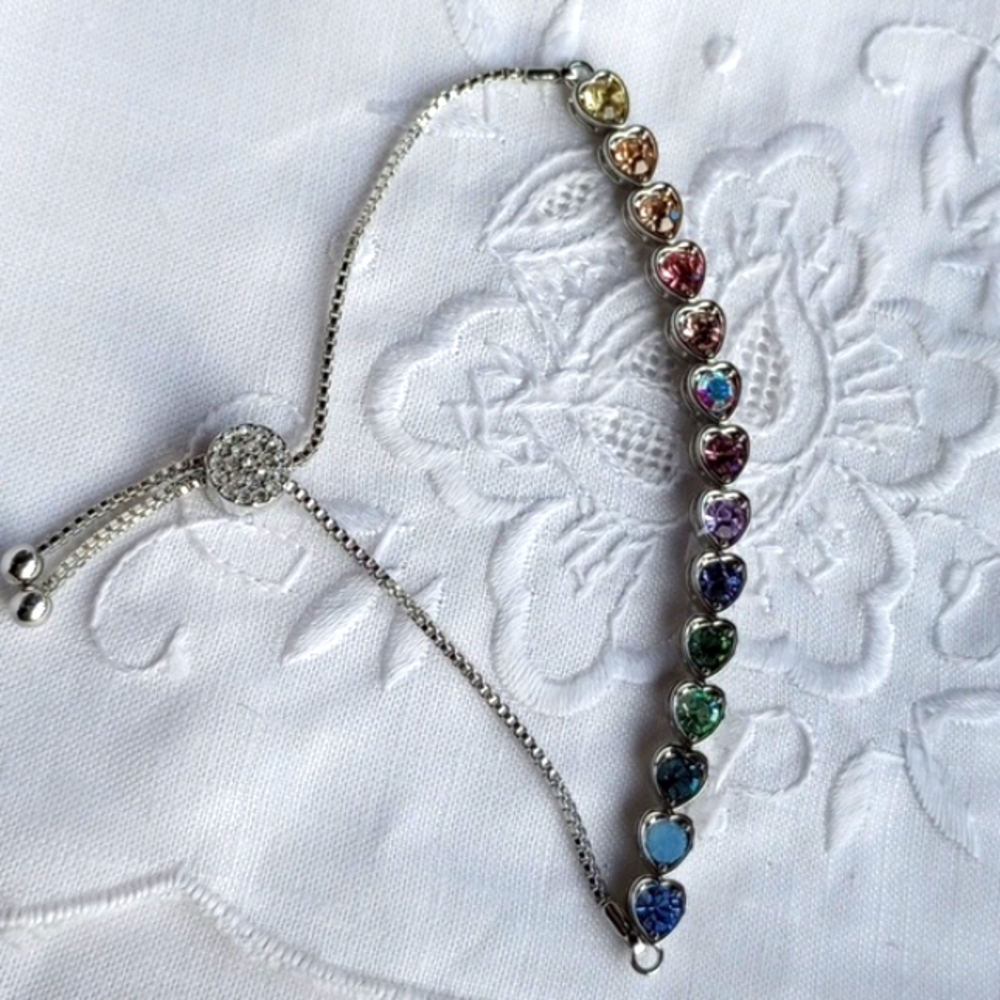 Pastel rainbow rhinestone heart tennis bracelet with bolo clasp silvertone